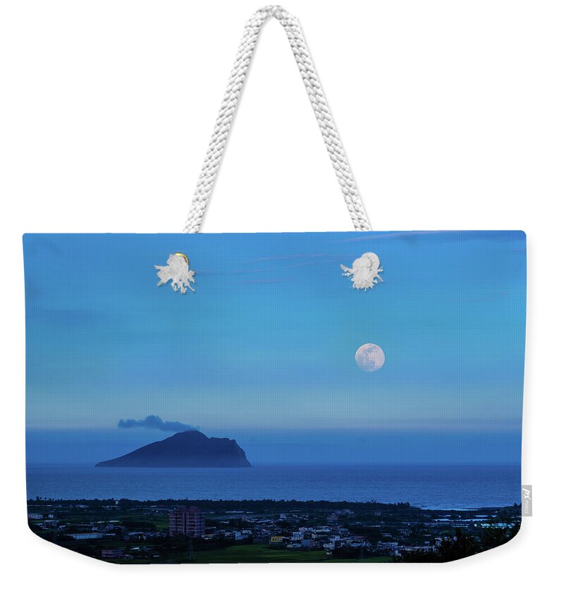 Tranquility Weekender Tote Bag featuring the photograph Turtle Island With Moon by Wan Ru Chen