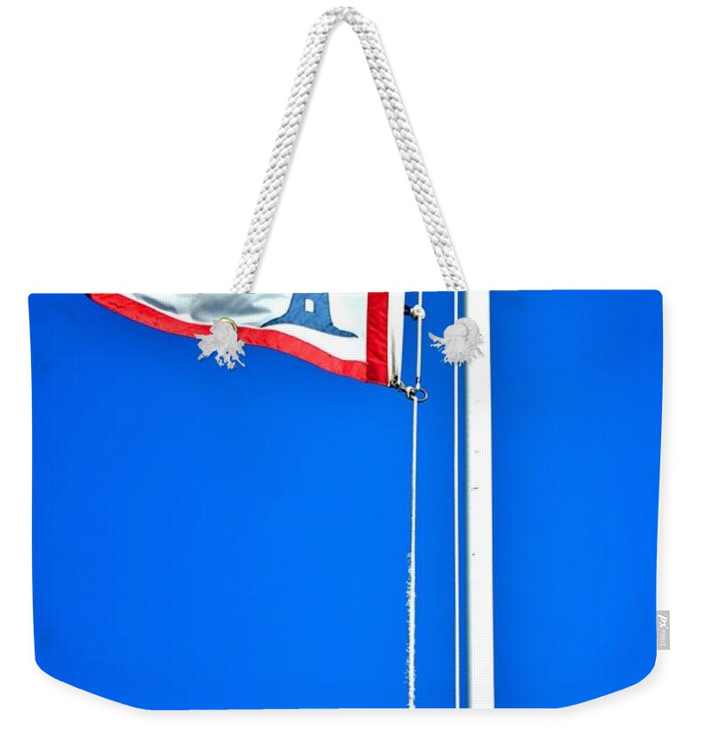 Tybee Island Weekender Tote Bag featuring the photograph Tybee Lighthouse Flag by Tara Potts