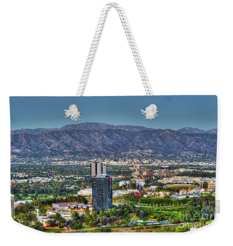 Clear Day Weekender Tote Bag featuring the photograph Universal City Warner Bros Studios Clear Day by David Zanzinger