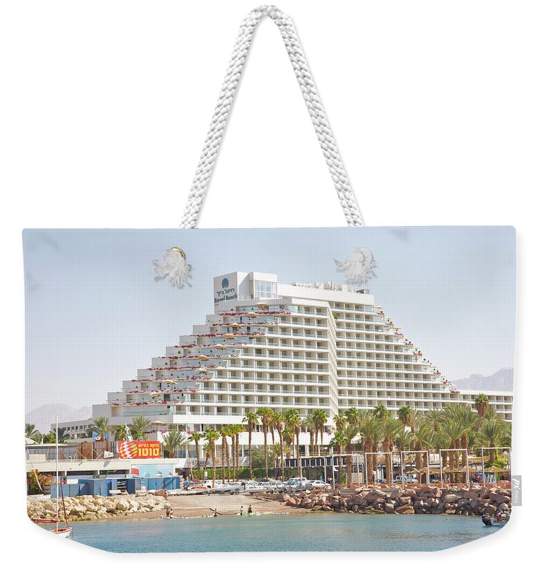 Viewpoint Weekender Tote Bag featuring the photograph Unusual Shape To Modern Hotel On Red Sea by Barry Winiker