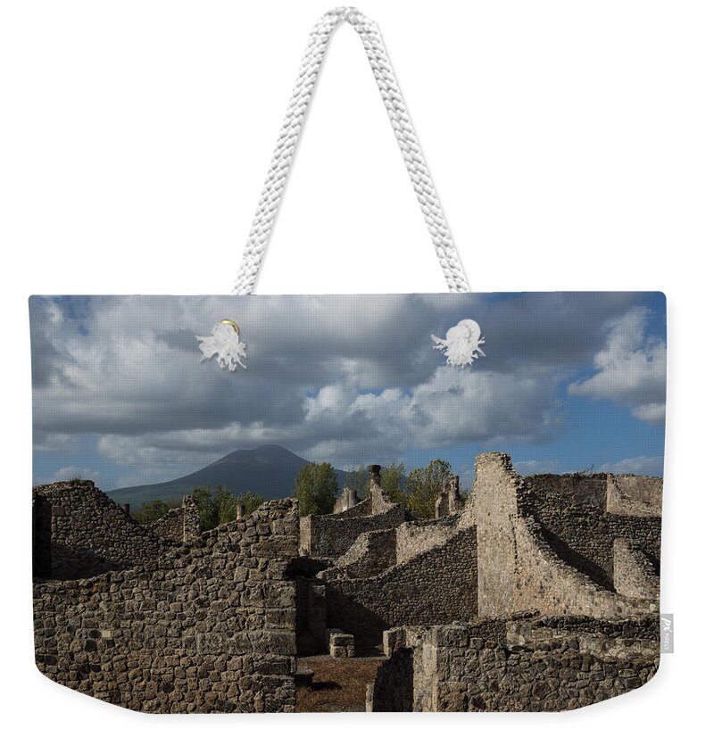 Pompeii Weekender Tote Bag featuring the photograph Vesuvius Towering Over the Pompeii Ruins by Georgia Mizuleva