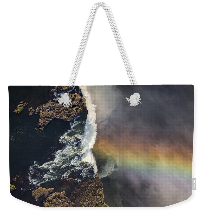Vincent Grafhorst Weekender Tote Bag featuring the photograph Victoria Falls And Rainbow Zimbabwe by Vincent Grafhorst