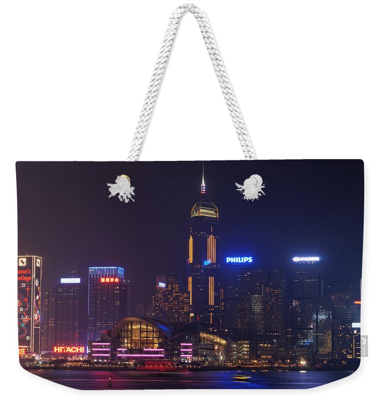 Downtown District Weekender Tote Bag featuring the photograph Victoria Harbour Skyliemn At Christmas by Wilfred Y Wong