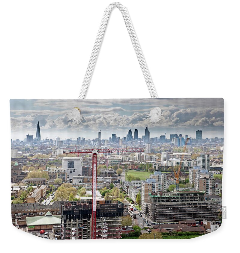 Construction Site Weekender Tote Bag featuring the photograph View Of East London by James Burns