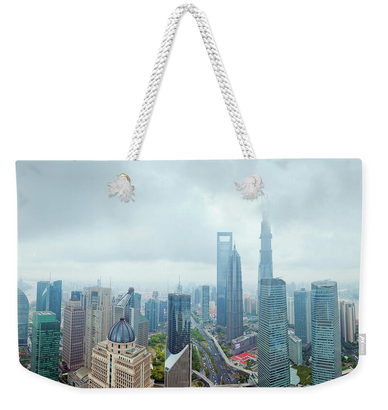 Built Structure Weekender Tote Bag featuring the photograph View Of Shanghai Lujiazui Financial by Pan Hong