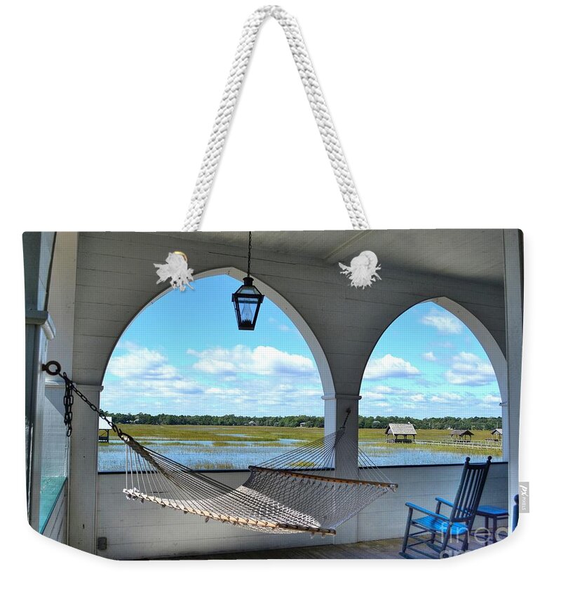 Scenic Weekender Tote Bag featuring the photograph View Of The Marsh From The Pelican Inn by Kathy Baccari