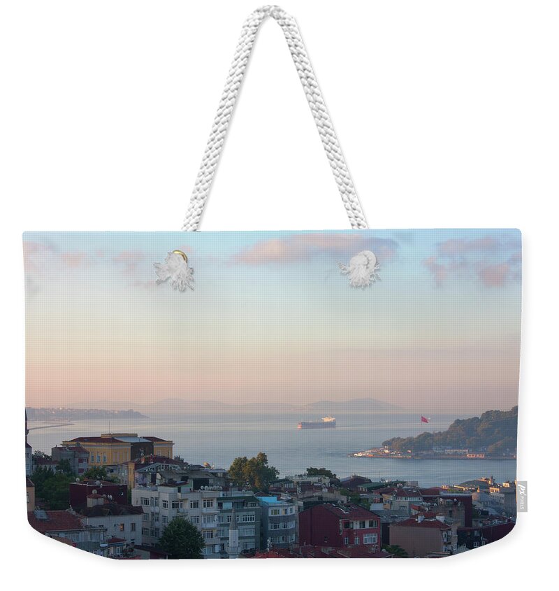 Istanbul Weekender Tote Bag featuring the photograph View Over Istanbul At Sunrise by Laurie Noble