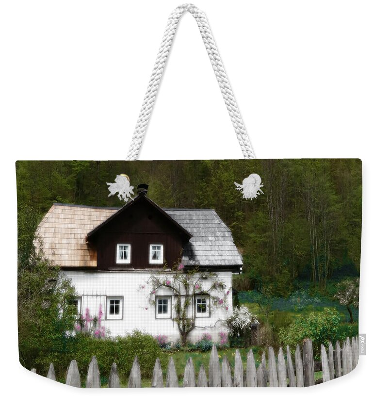 English Cottage Photo Weekender Tote Bag featuring the photograph Vine Covered Cottage with Rustic Wooden Picket Fence by Brooke T Ryan