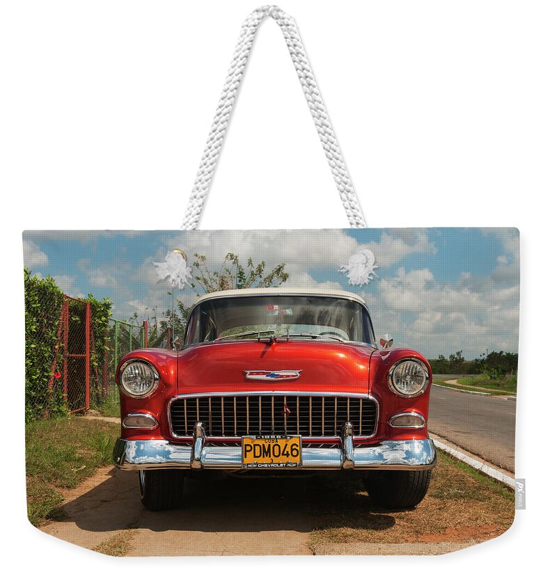 Latin America Weekender Tote Bag featuring the photograph Vintage American Car In Cuba by John Elk Iii
