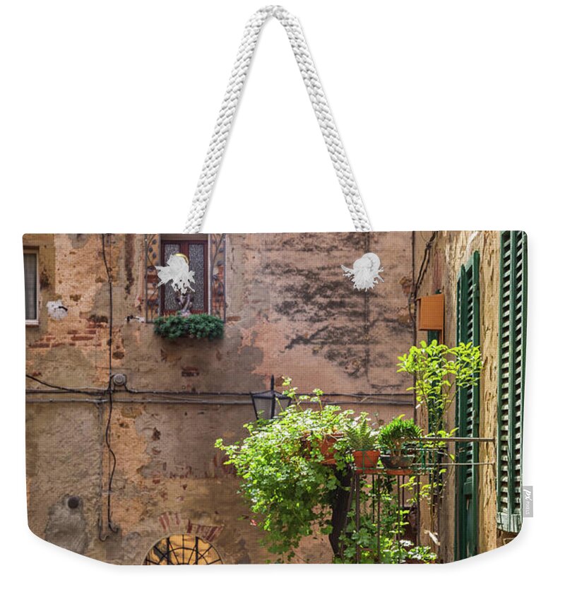 Suburb Weekender Tote Bag featuring the photograph Vintage Balcony On The Street In Italy by Shaiith