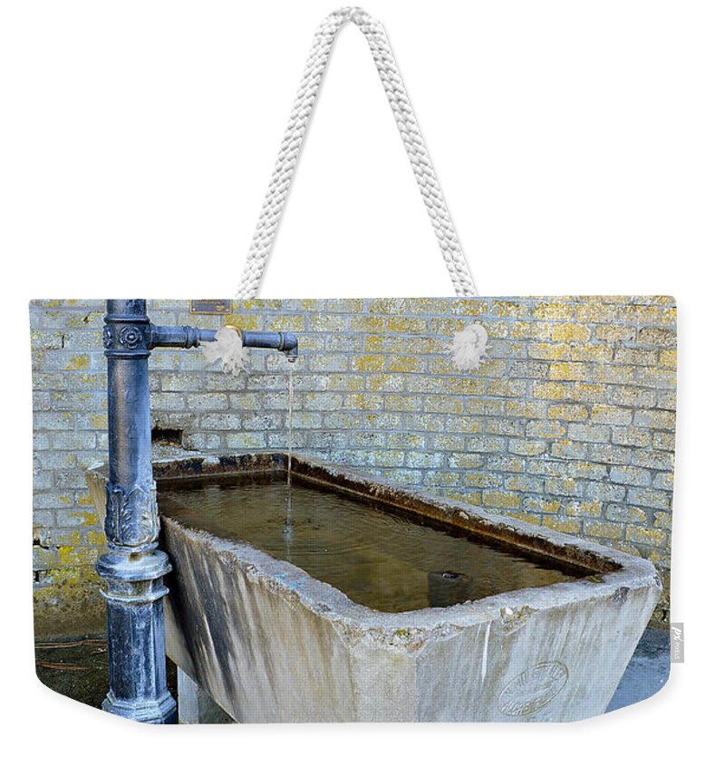 Wet Weekender Tote Bag featuring the photograph Vintage fountain by Felicia Tica
