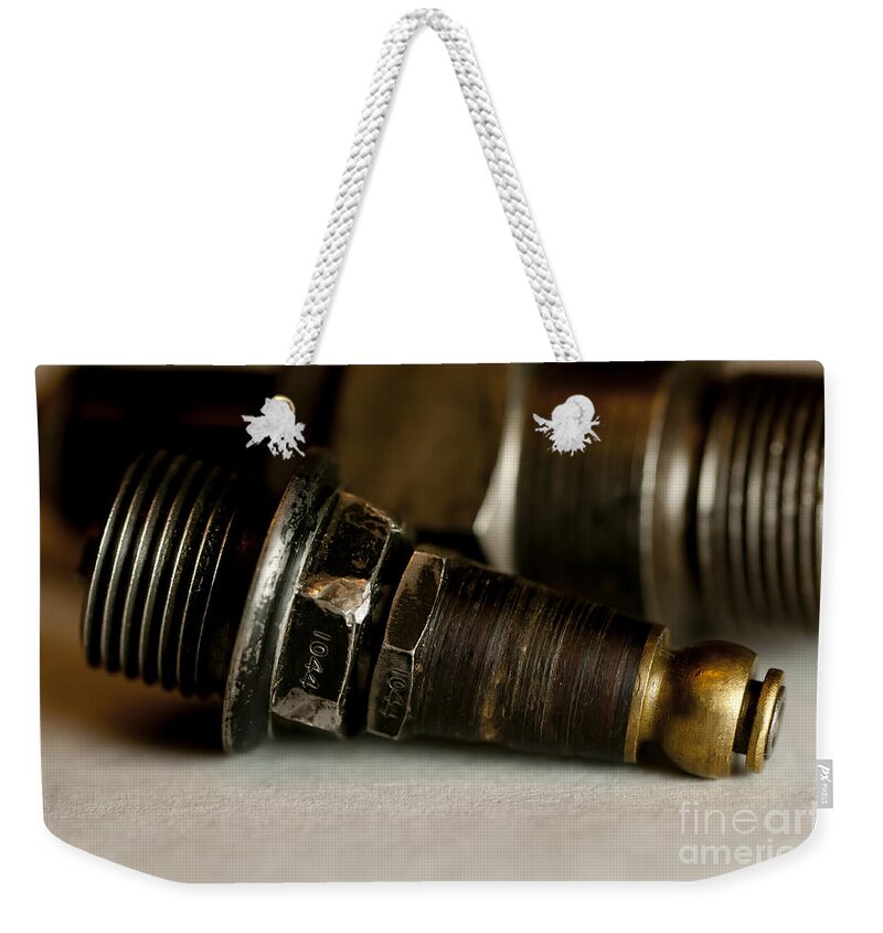 Motorcycle Spark Plugs Weekender Tote Bag featuring the photograph Vintage Motorcycle Spark Plugs by Wilma Birdwell