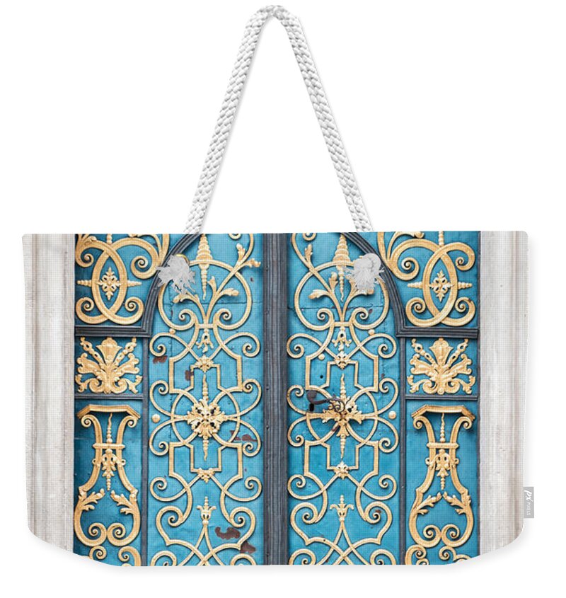 Arch Weekender Tote Bag featuring the photograph Vintage Old Blue Door With A Gold by Bogdan Khmelnytskyi