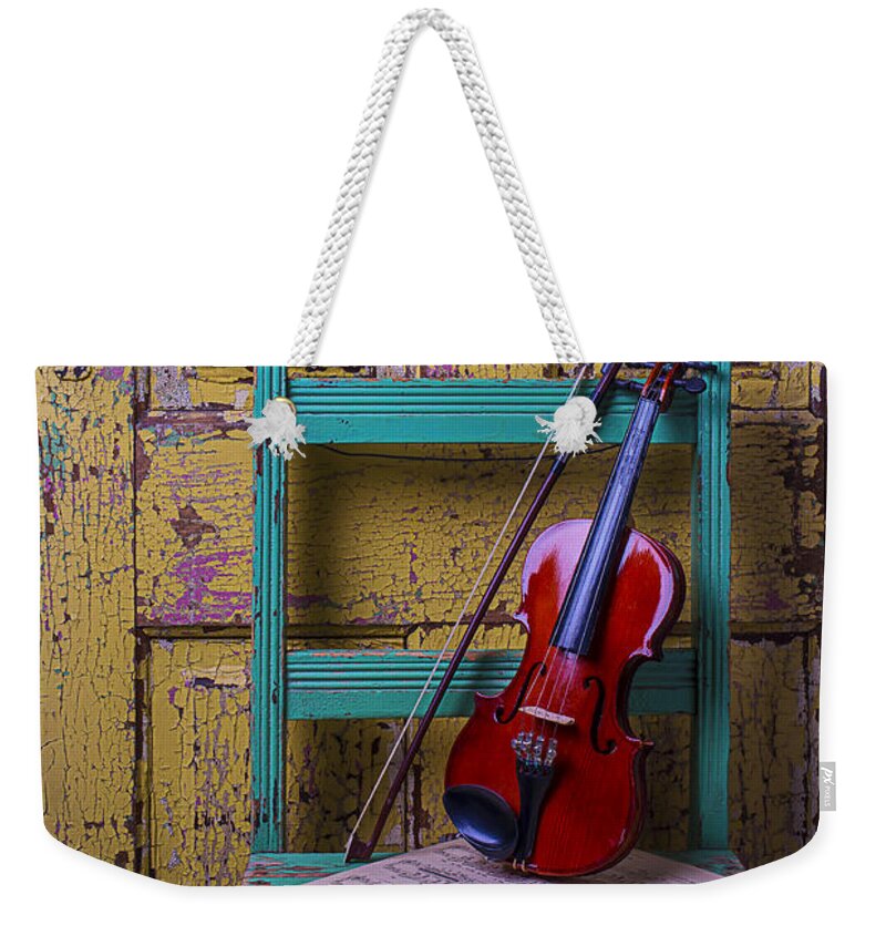 Old Weekender Tote Bag featuring the photograph Violin On Worn Green Chair by Garry Gay