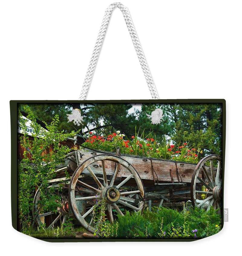  Antique Wagon Weekender Tote Bag featuring the photograph Wagon Garden by Kae Cheatham
