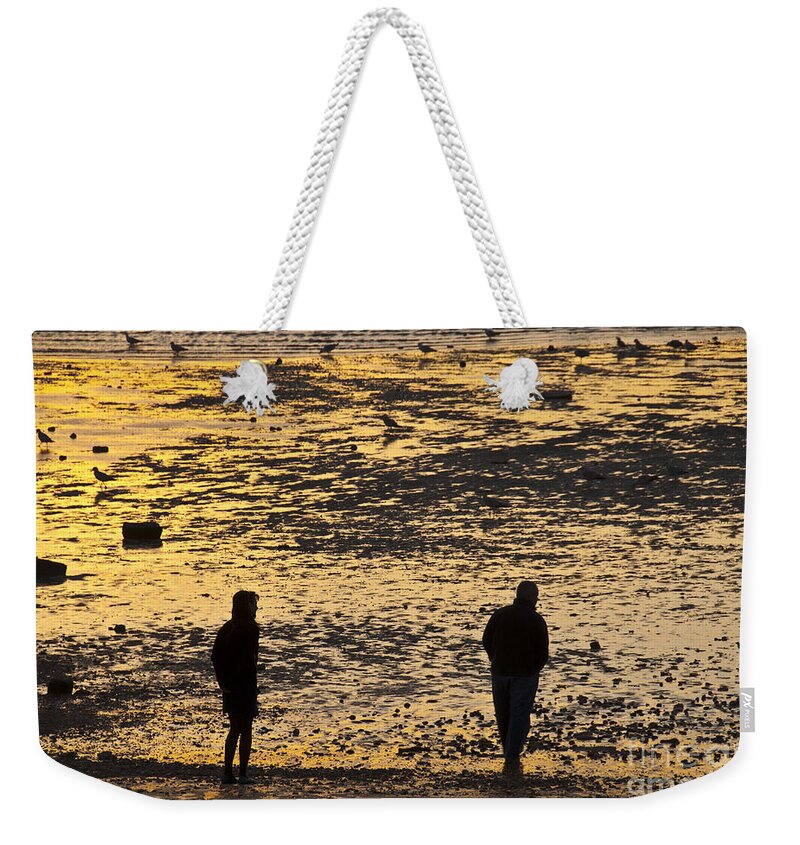 Walkers Weekender Tote Bag featuring the photograph Strangers On A Shore - Walking Silhouettes by James Lavott