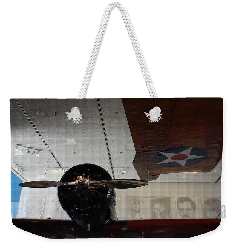 Aviators Weekender Tote Bag featuring the photograph Wall of Great Aviators by Kenny Glover