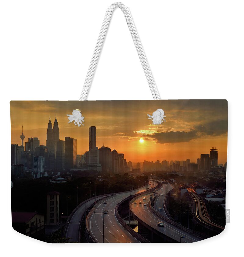 Land Vehicle Weekender Tote Bag featuring the photograph Warm Kuala Lumpur Skyline by Aaronlam