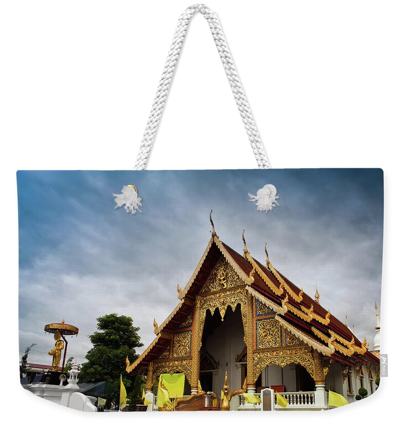 Wat Phra Sing Weekender Tote Bag featuring the photograph Wat Phra Singh Temple Chiang Mai by Edenexposed