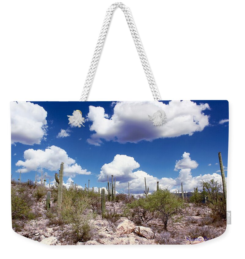 Beautiful Day Weekender Tote Bag featuring the photograph Watching the Clouds Go By by Kume Bryant