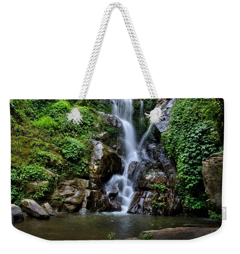 Tranquility Weekender Tote Bag featuring the photograph Waterfall by Beyondmylens@harsh / Photography