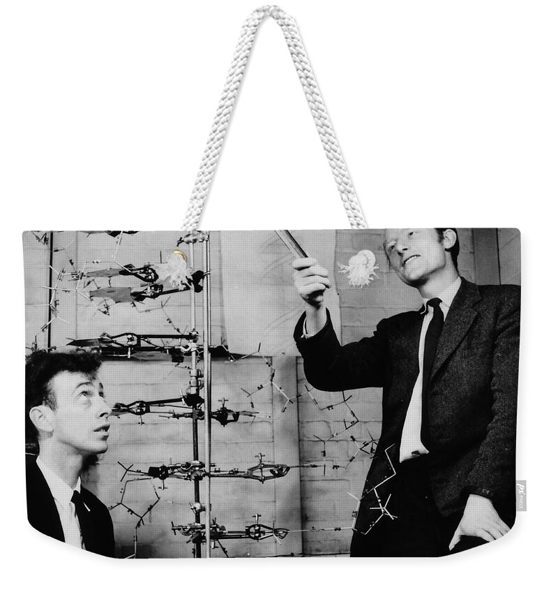 Watson Weekender Tote Bag featuring the photograph Watson and Crick with DNA Model by A Barrington Brown