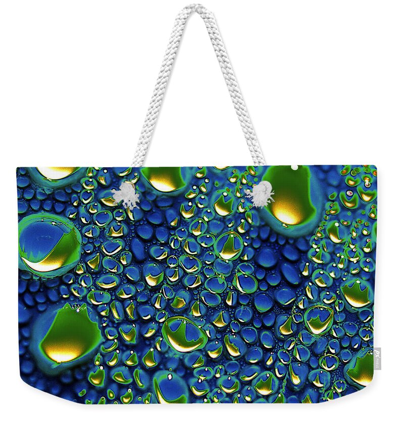 Water Weekender Tote Bag featuring the photograph Wax Holds Up by Joe Schofield