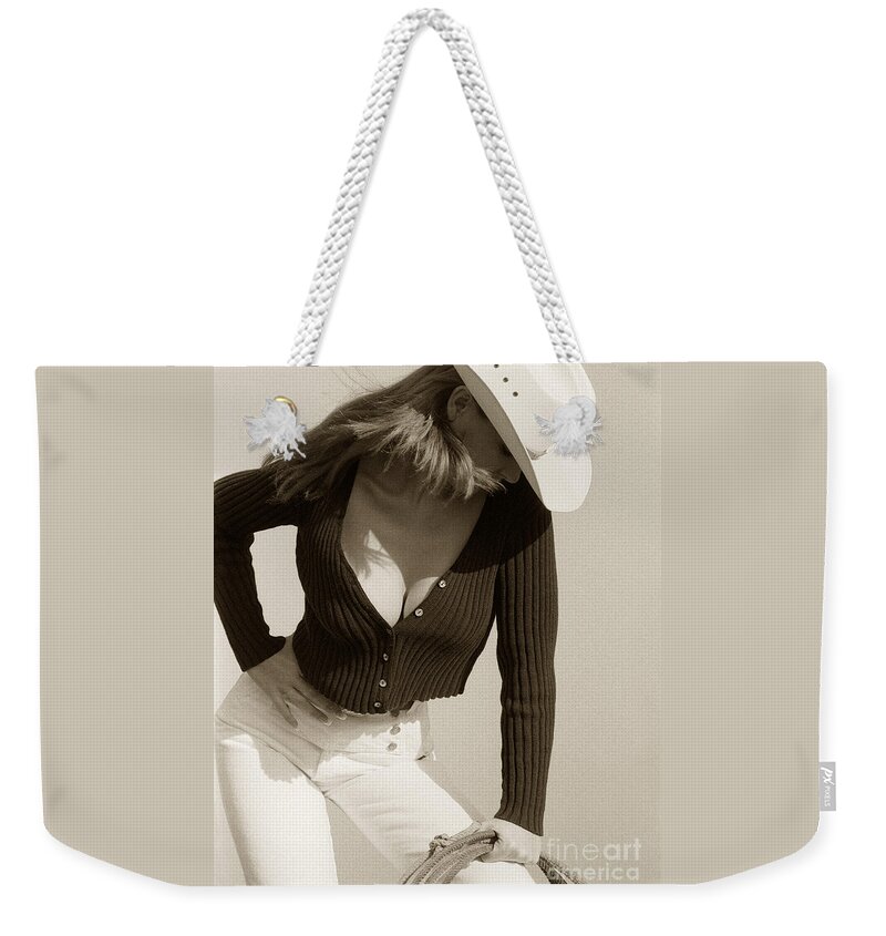 Cowgirl Weekender Tote Bag featuring the photograph What Color is My Hat by Don Schimmel