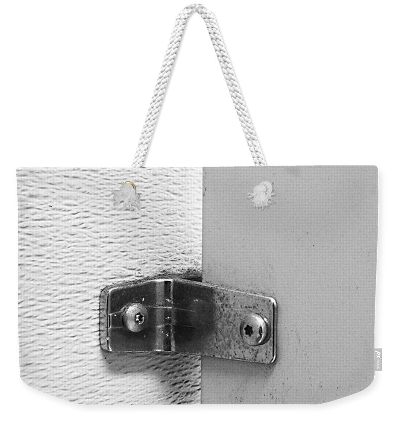 Black And White Weekender Tote Bag featuring the photograph What holds the door by Fei A