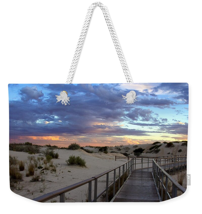 White Sands Weekender Tote Bag featuring the photograph White Sands Boardwalk at Sunset by Diana Powell