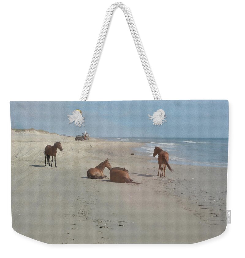 Wild Spanish Mustangs Weekender Tote Bag featuring the photograph Wild Horses on the beach by Tracy Winter