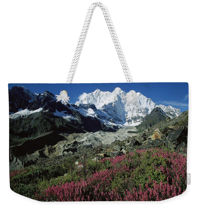 Feb0514 Weekender Tote Bag featuring the photograph Wildflowers And Kangshung Glacier by Colin Monteath