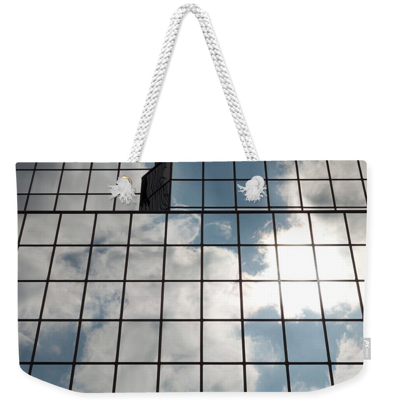 Downtown District Weekender Tote Bag featuring the photograph Windows Of Glass Building by Moniaphoto