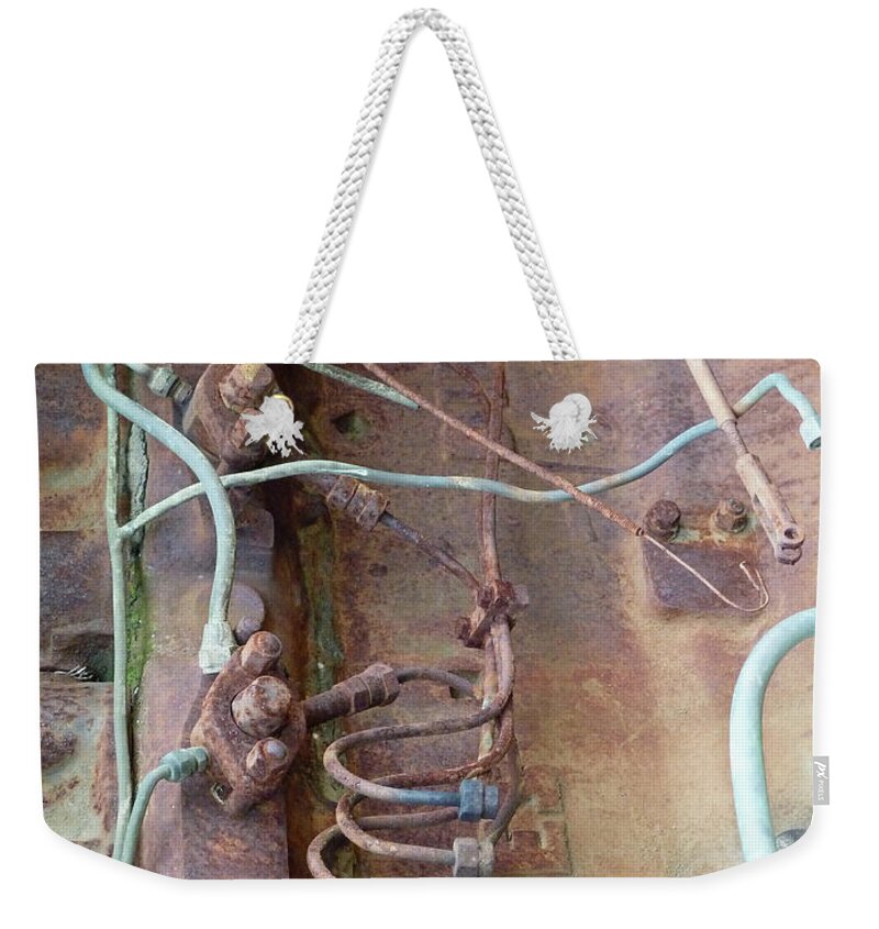 Newel Hunter Weekender Tote Bag featuring the photograph Wired by Newel Hunter