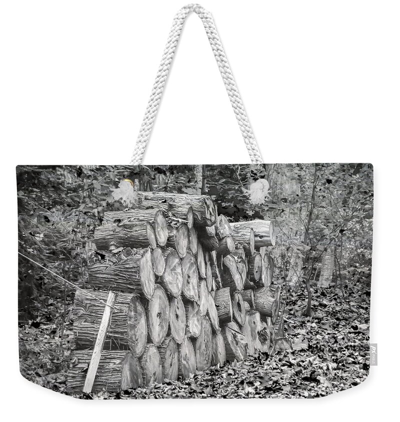 Wood Lot Weekender Tote Bag featuring the photograph Wood Pile by Keith Armstrong