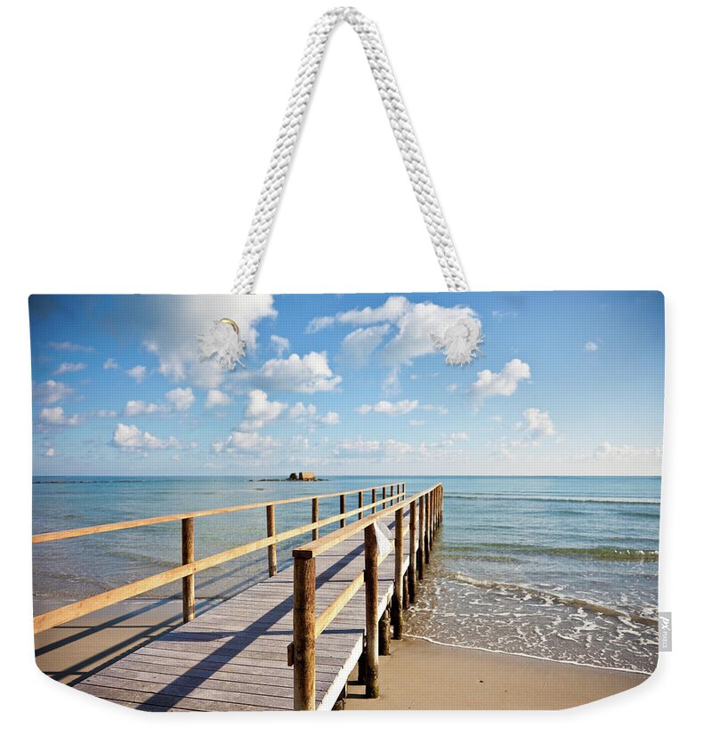 Scenics Weekender Tote Bag featuring the photograph Wooden Pontoon Bridge by Piccerella