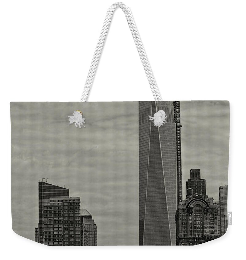 World Trade Center Weekender Tote Bag featuring the photograph World Trade Center construction by Jonathan Davison