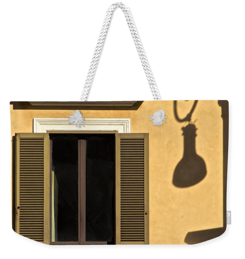 Light Post Weekender Tote Bag featuring the photograph Wrought Iron Street Lamp Shadow of Ancient Rome by David Letts