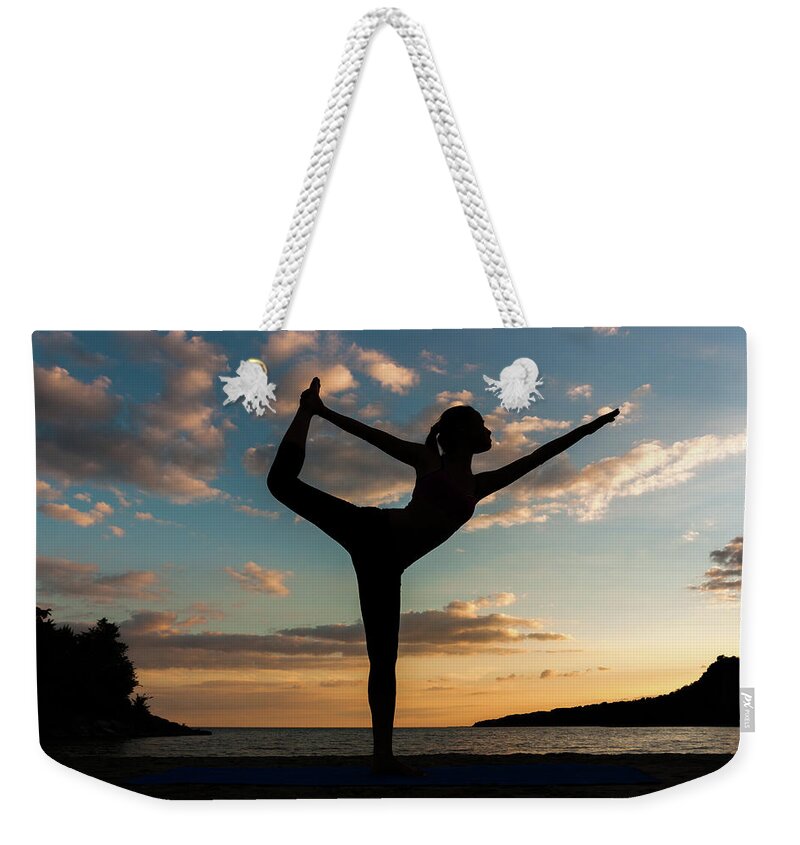 Adolescence Weekender Tote Bag featuring the photograph Yoga At Sunset by Kurt Budiarto Photography