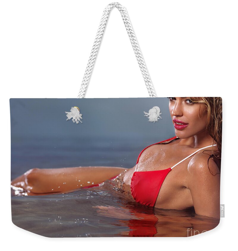 Young glamorous woman in red bikini lying in water Weekender Tote Bag by  Maxim Images Exquisite Prints - Pixels