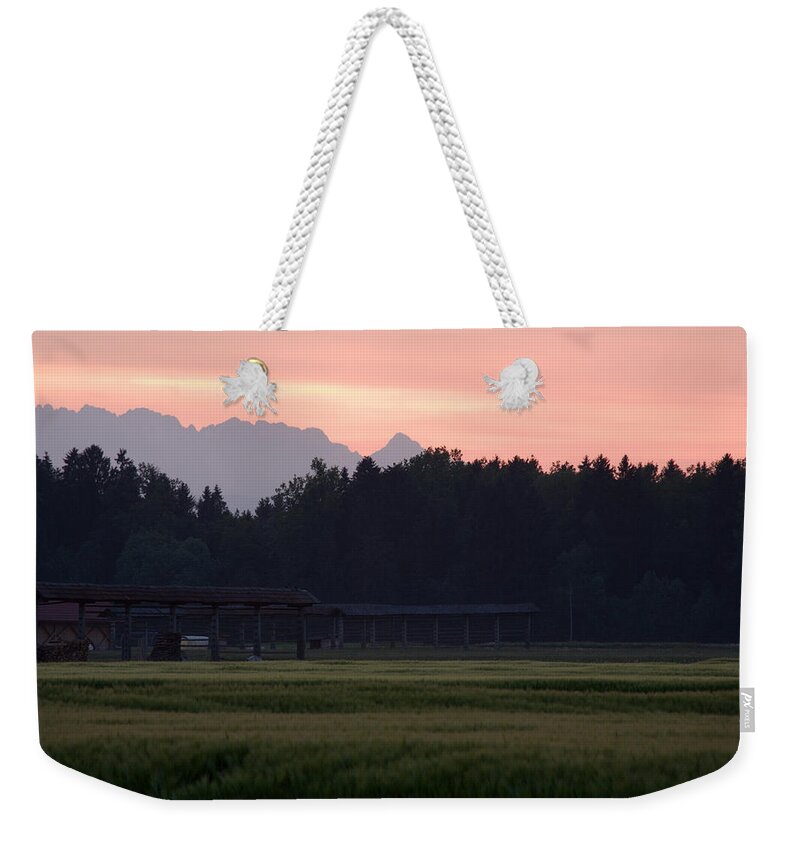 Julian Weekender Tote Bag featuring the photograph Alpine sunset #1 by Ian Middleton