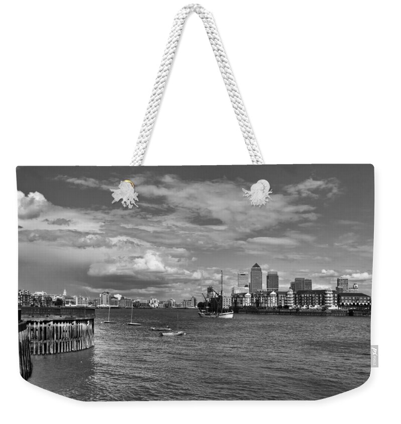 Thames River Weekender Tote Bag featuring the photograph Canary Wharf #1 by Shirley Mitchell