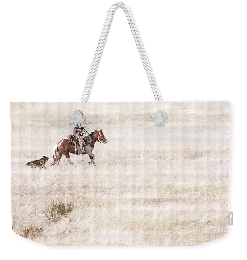 Cowboy Weekender Tote Bag featuring the photograph Cowboy and Dog #1 by Cindy Singleton