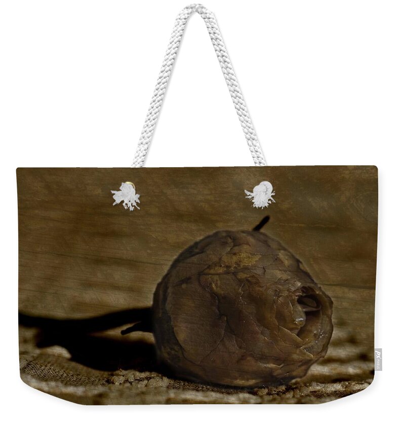 Rosebud Weekender Tote Bag featuring the photograph Dead Rosebud #1 by Steve Purnell
