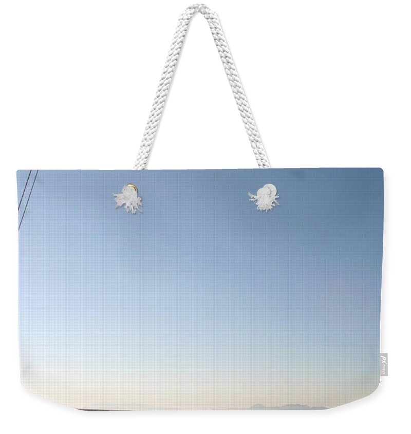 Greece Weekender Tote Bag featuring the photograph Greek Flag over Sandy Beaches #1 by La Dolce Vita