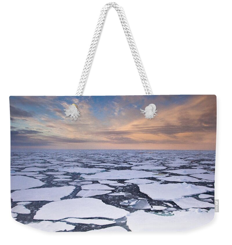 00427975 Weekender Tote Bag featuring the photograph Ice Floes At Sunset Near Mertz Glacier #1 by Colin Monteath