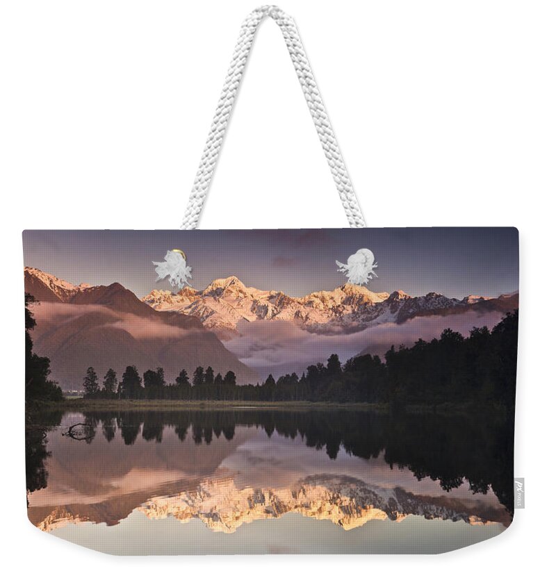 00438694 Weekender Tote Bag featuring the photograph Mount Cook And Mount Tasman And Lake #1 by Colin Monteath