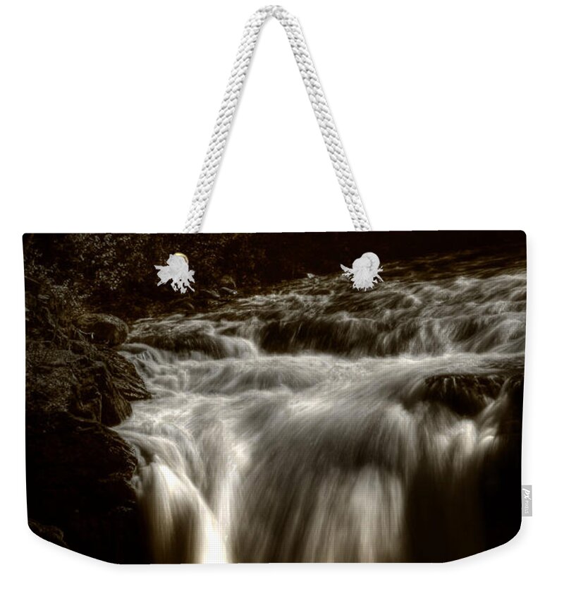 Monochrome Weekender Tote Bag featuring the photograph Over The Top #1 by Greg DeBeck