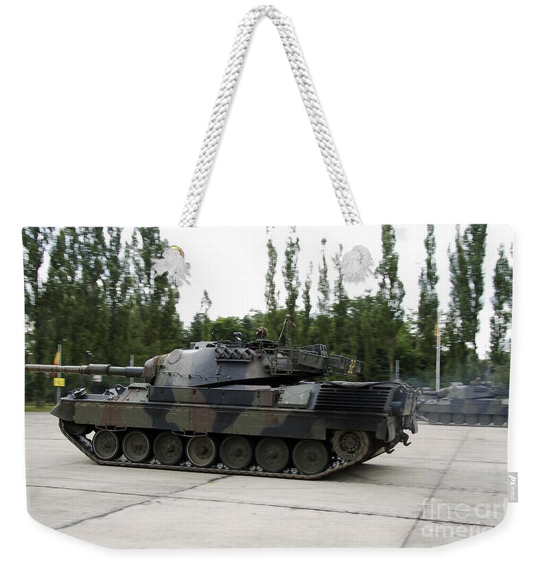 Adults Only Weekender Tote Bag featuring the photograph The Leopard 1a5 Of The Belgian Army #1 by Luc De Jaeger