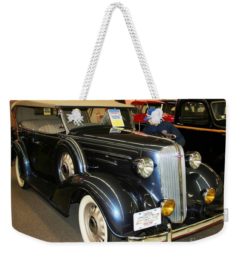 Chevrolet Weekender Tote Bag featuring the photograph 1936 Chevrolet Phaeton by John Black